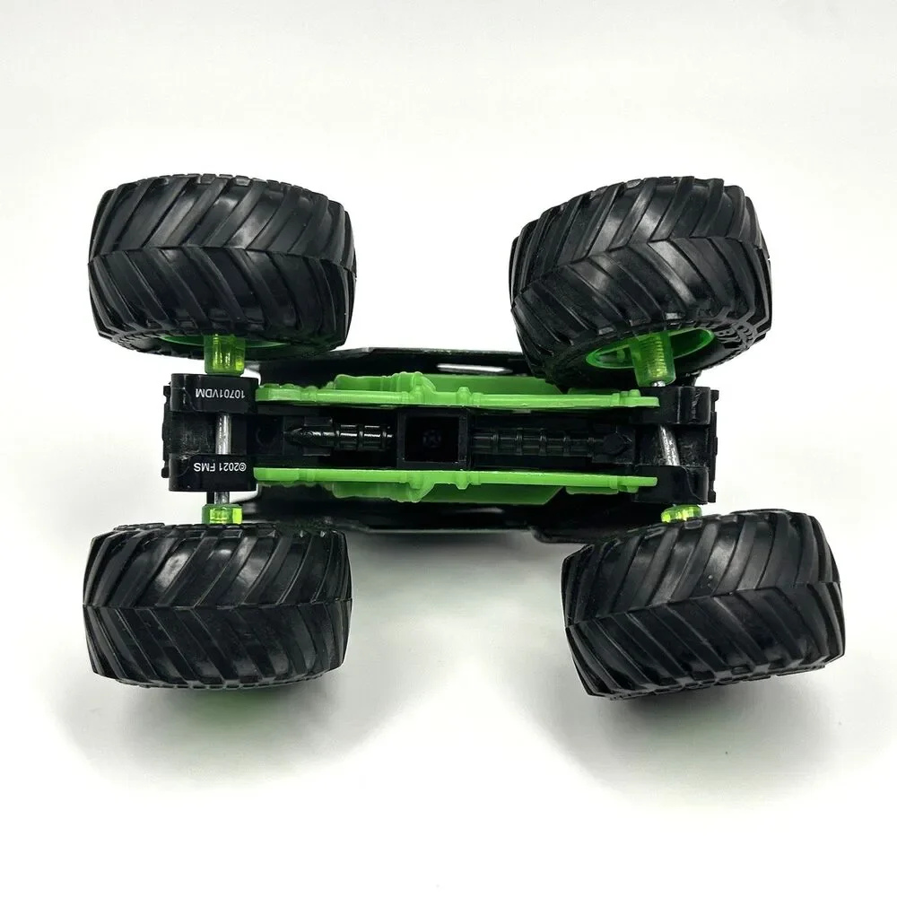 Monster Jam Grave Digger 1:64 Monster Truck Green Rims BKT Tires Bad to the bone